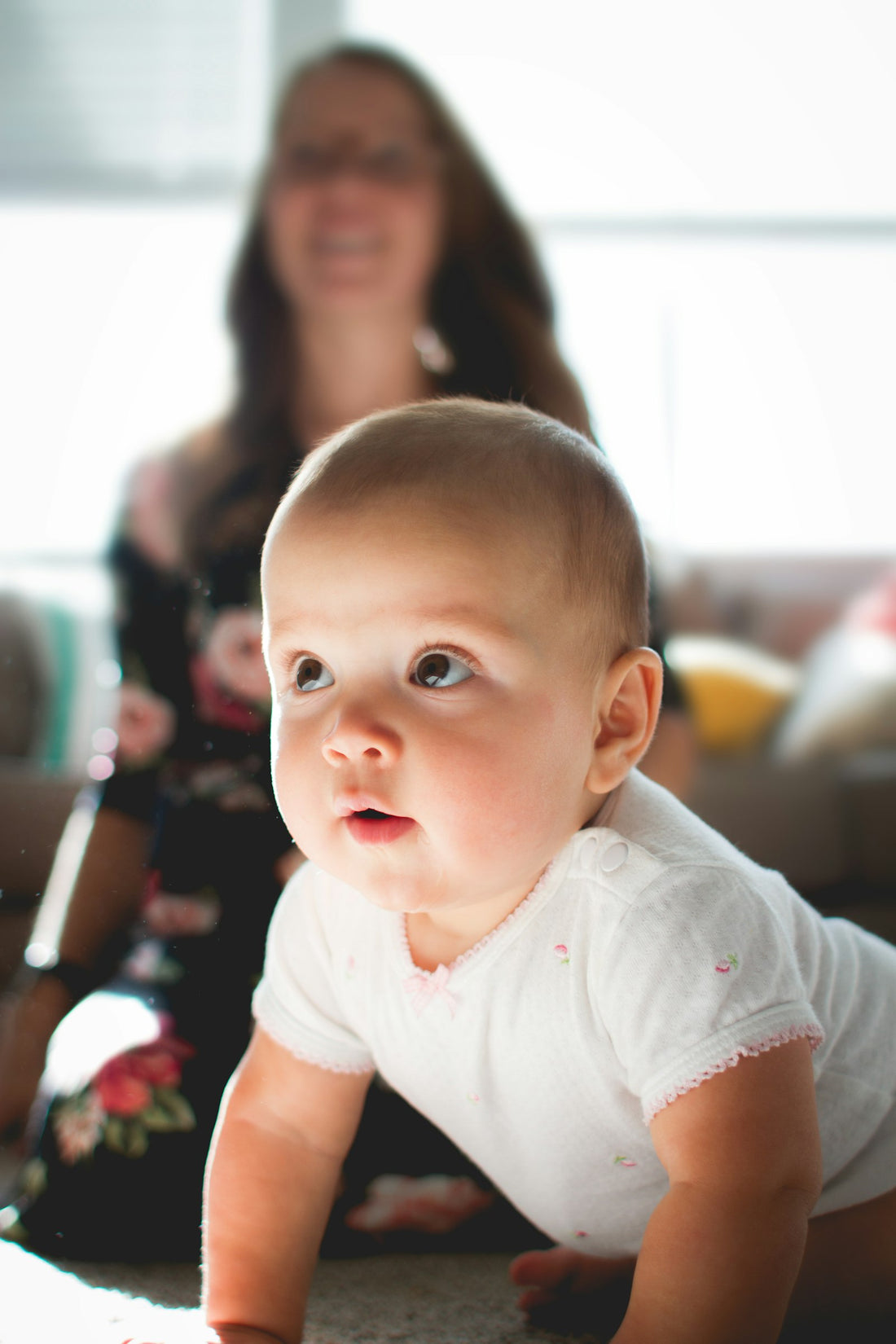 Baby crawling on the floor during tummy time
