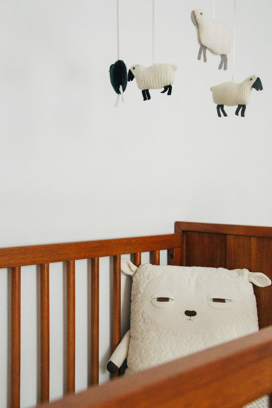 Crib in a nursery room ready for baby monitoring