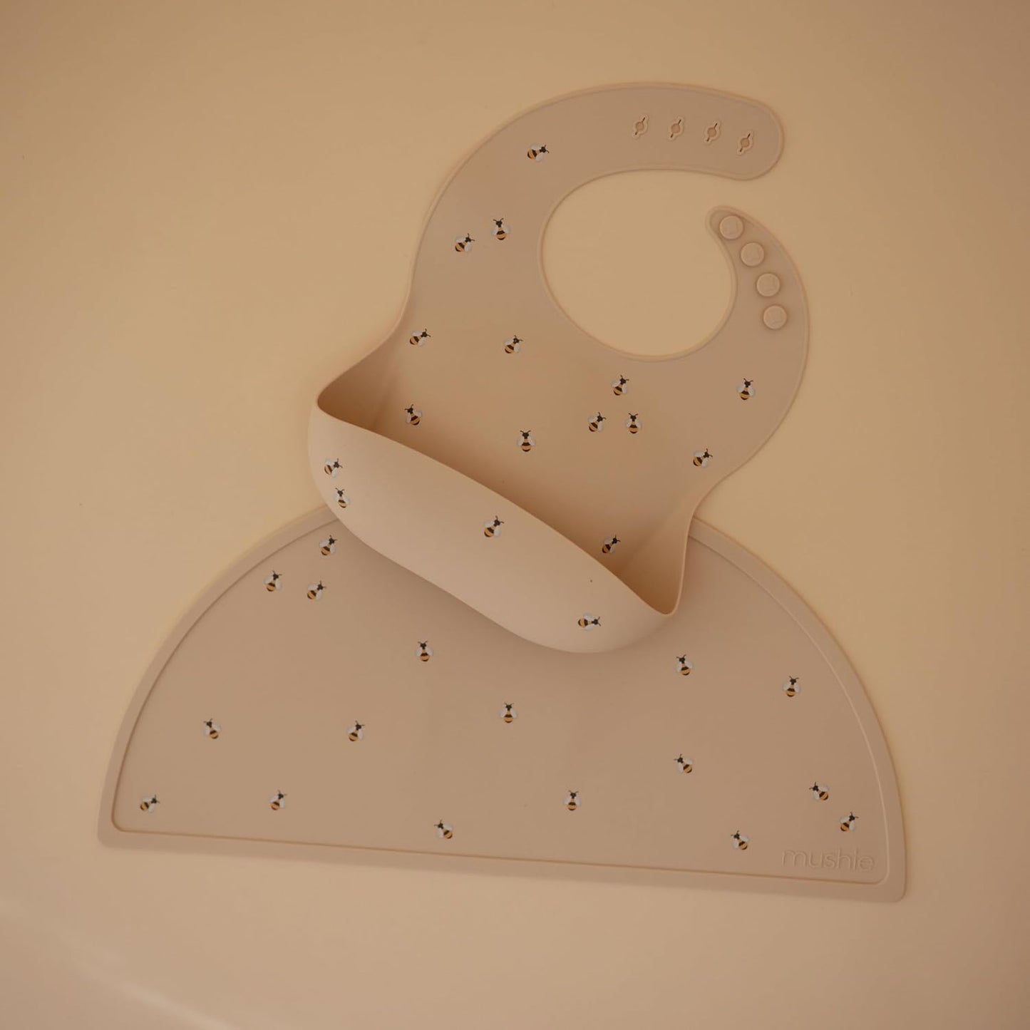 mushie Silicone Baby Bib | Adjustable Fit Waterproof Bibs (Bees)