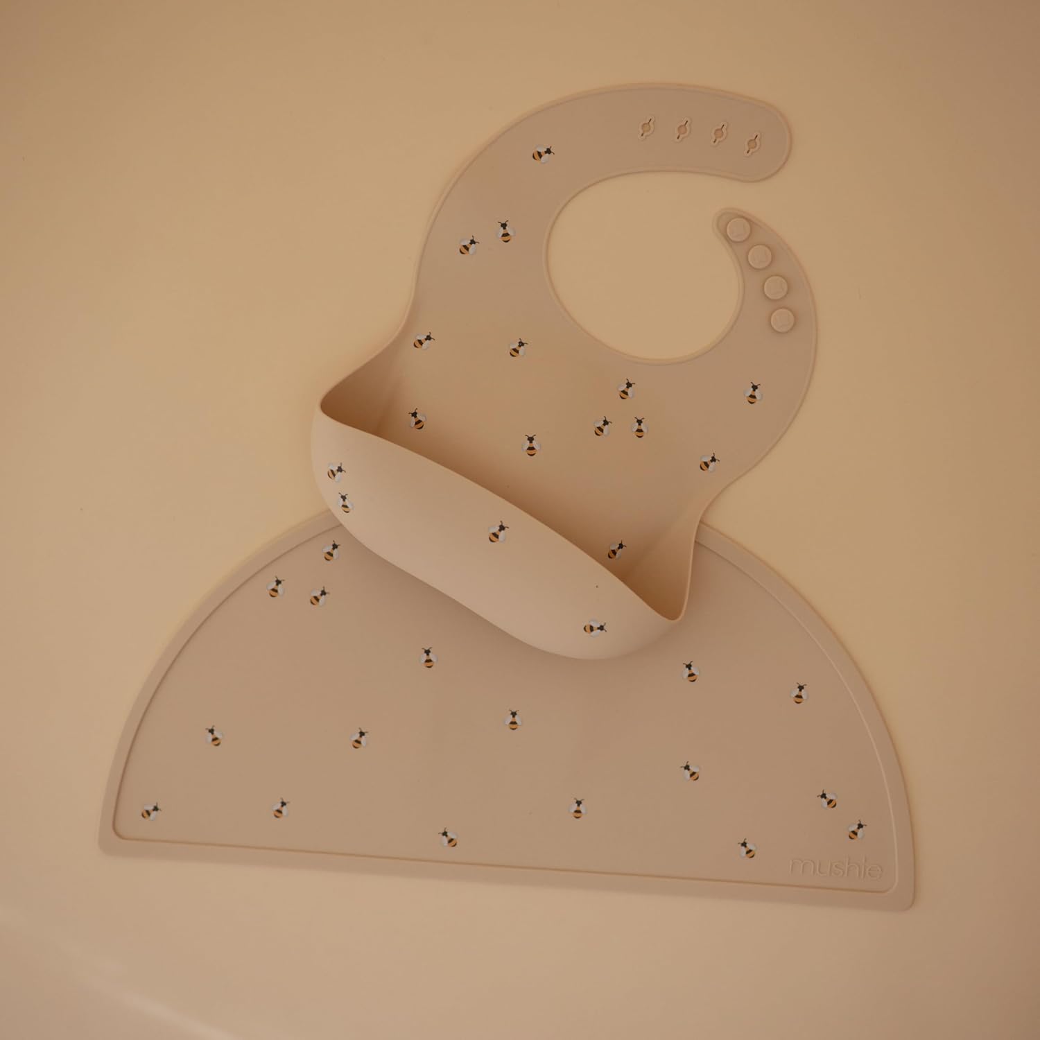 mushie Silicone Baby Bib | Adjustable Fit Waterproof Bibs (Bees)
