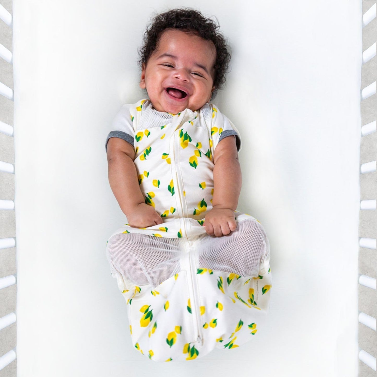 Happiest Baby Sleepea 5-Second Swaddle - Organic Cotton Baby Swaddle Blanket - Doctor Designed Promotes Healthy Hip Development (Ivory Lemons, Medium)