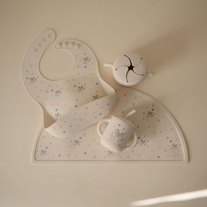 mushie x Bluey Silicone Baby Bib | Adjustable Fit Waterproof Bibs (Bluey Ivory)
