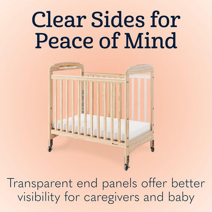 Foundations Serenity Compact Clearview Daycare Crib, Fixed Side, Durable Wood Construction, Non-Marking Casters (2 Locking), Clear End Panels, Includes 3” InfaPure Foam Mattress (White)