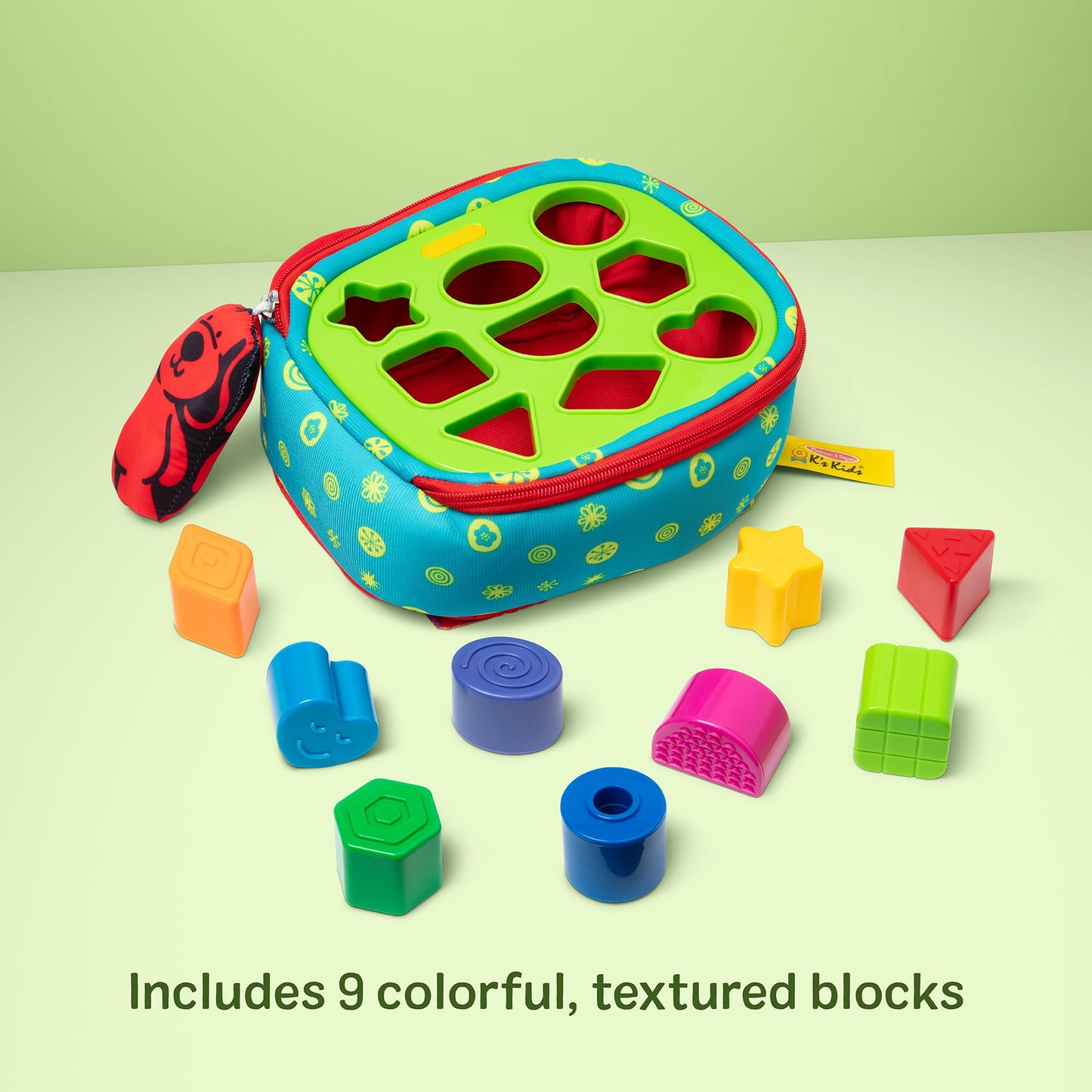 Melissa & Doug K’s Kids Take-Along Shape Sorter, 9 Textured Building Blocks & Soft Sensory Activity