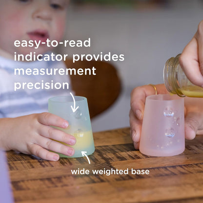 Olababy First Cup | Clear Sense 100% Silicone Infant Trainer Cup | 2oz Medicine Cup for Newborn | Non-Slip & Sloping Design for Tiny Hands & Baby Led Weaning (Mint/Lilac, 2 Cups)