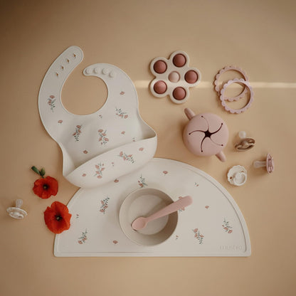 mushie Silicone Baby Bib | Adjustable Fit Waterproof Bibs (Pink Flowers)