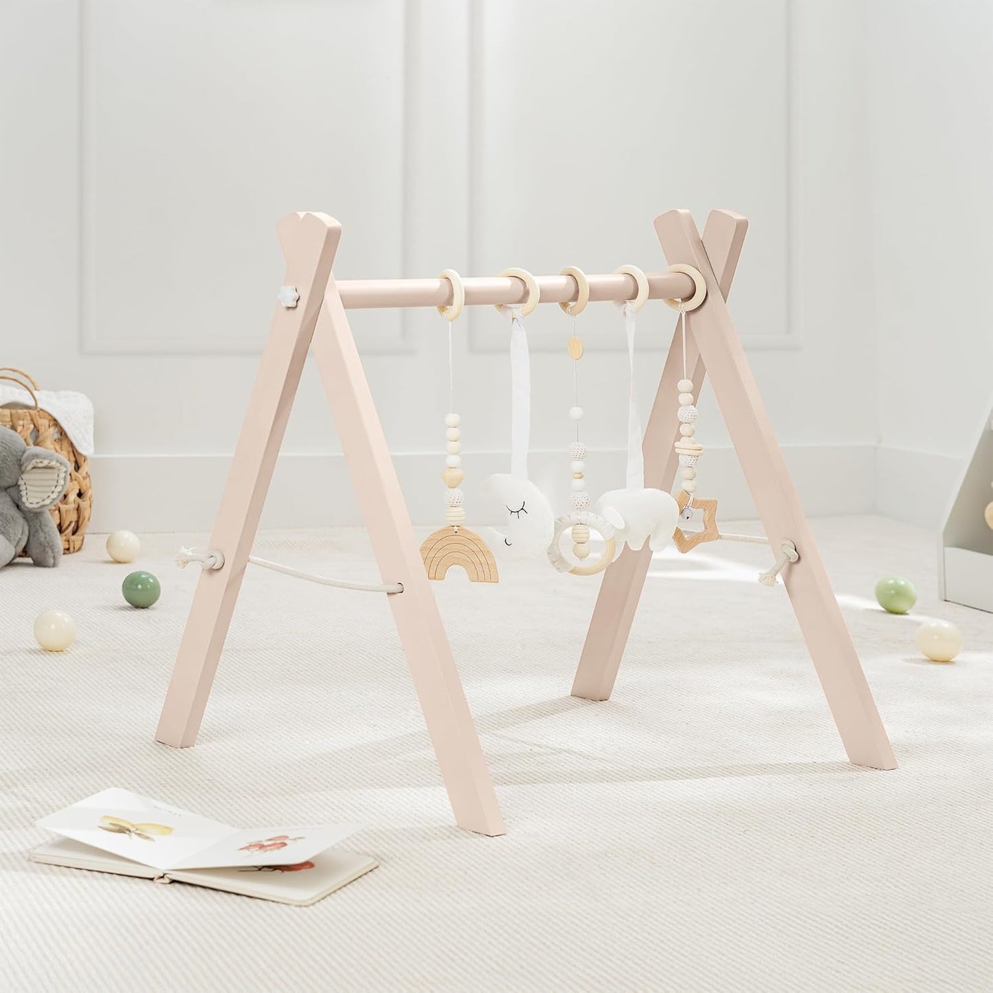 Comfy Cubs Wooden Baby Play Gym - Natural Finish Pinewood Baby Activity Gym with 5 Sensory Hanging Toys - Easy No-Tool Assembly, Safe and Durable for Infant Motor and Visual Development - Blush