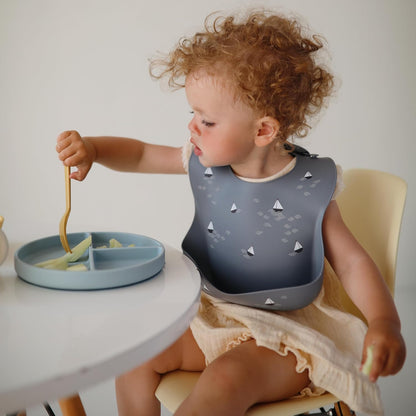 mushie Silicone Baby Bib | Adjustable Fit Waterproof Bibs (Planets)
