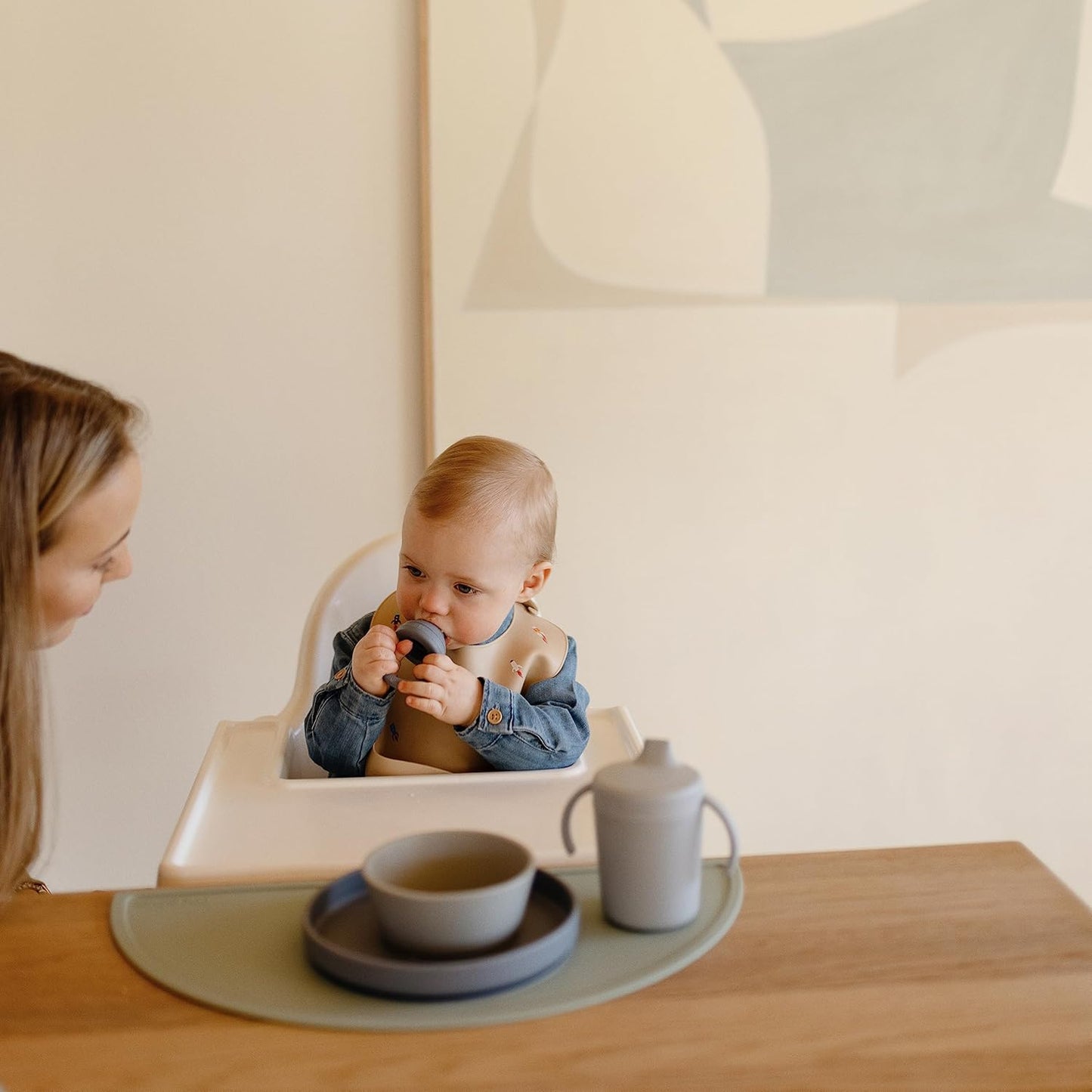 mushie Silicone Baby Bib | Adjustable Fit Waterproof Bibs (Rocket Ship)