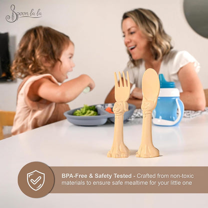 Made in USA Spoon la la Toddler Utensils Set (2 Pack) & Board Book - Spoon & Fork for Kids, Self-Standing 3D Ergonomic Cat & Dog Handles, BPA-free, Dishwasher Safe Baby Silverware (Yellow)