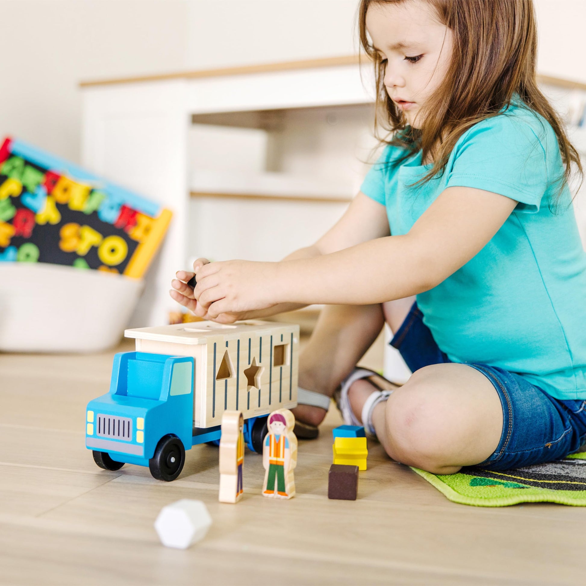 Melissa & Doug Shape-Sorting Dump Truck Wooden Toy with 9 Blocks and 2 Toy Figures - Montessori